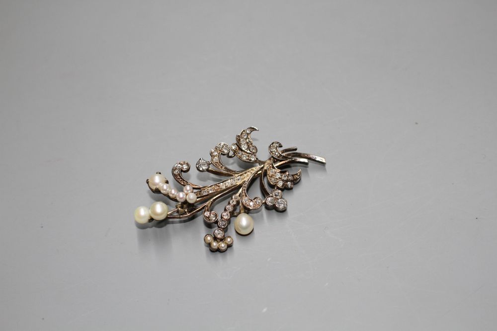 An early-mid 20th century yellow metal, cultured pearl and diamond set floral spray brooch,